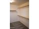 Spacious walk-in closet with double hanging rods and shelves at 36285 N Mirandesa Dr, San Tan Valley, AZ 85143