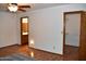 Bright bedroom with wood flooring and ensuite bathroom at 431 W Knox Rd, Chandler, AZ 85225