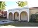 Spanish-style home with a covered entryway and well-manicured lawn at 431 W Knox Rd, Chandler, AZ 85225