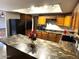 Bright kitchen, granite counters, oak cabinets at 431 W Knox Rd, Chandler, AZ 85225