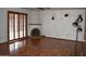 Living room with hardwood floors and fireplace at 431 W Knox Rd, Chandler, AZ 85225