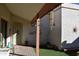 Covered patio with terracotta tile flooring and various plants at 431 W Knox Rd, Chandler, AZ 85225