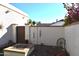 Private backyard patio with fire pit and decorative accents at 431 W Knox Rd, Chandler, AZ 85225