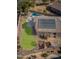 Property overview showcasing the home, pool, lush lawn, and solar panels at 43102 W Venture Rd, Maricopa, AZ 85138