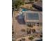 House featuring solar panels and a pool at 43102 W Venture Rd, Maricopa, AZ 85138