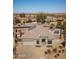 Single-story house with pool and solar panels at 43102 W Venture Rd, Maricopa, AZ 85138