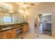 Bathroom boasts double sinks and granite countertops at 43102 W Venture Rd, Maricopa, AZ 85138