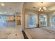 Bright dining room with a view of the kitchen at 43102 W Venture Rd, Maricopa, AZ 85138