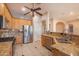 Kitchen features stainless steel appliances and granite countertops at 43102 W Venture Rd, Maricopa, AZ 85138