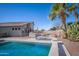 Resort-style backyard oasis with pool and patio at 43102 W Venture Rd, Maricopa, AZ 85138