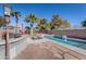 Inviting pool area with built-in BBQ and lounge chairs at 43102 W Venture Rd, Maricopa, AZ 85138