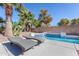 Luxury pool with patio and lounge chairs at 43102 W Venture Rd, Maricopa, AZ 85138