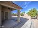 Covered patio, landscaped with trees and gravel at 4710 E Torrey Pines Ln, Chandler, AZ 85249