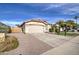 Single-story home with attached garage and landscaped front yard at 4710 E Torrey Pines Ln, Chandler, AZ 85249