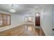 Bright living room featuring hardwood floors and plantation shutters at 4710 E Torrey Pines Ln, Chandler, AZ 85249