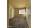 Bright bedroom featuring a window and neutral wall colors at 4730 W Rose Ln, Glendale, AZ 85301