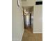 Hallway with tile floors and neutral colored walls at 4730 W Rose Ln, Glendale, AZ 85301