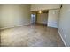 Bright living room with tile floors and high ceilings at 4730 W Rose Ln, Glendale, AZ 85301