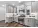 Bright kitchen with white cabinets, stainless steel appliances, and subway tile backsplash at 5100 E Rancho Paloma Pkwy # 1014, Cave Creek, AZ 85331