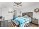 Main bedroom with wood floors and a ceiling fan at 5100 E Rancho Paloma Pkwy # 1014, Cave Creek, AZ 85331