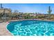 Refreshing community pool with ample lounge chairs and umbrellas at 5100 E Rancho Paloma Pkwy # 1014, Cave Creek, AZ 85331