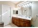 Double vanity bathroom with a large mirror at 5352 N Gila Trail Dr, Eloy, AZ 85131