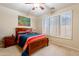 Bedroom with wood bed frame and window shutters at 5352 N Gila Trail Dr, Eloy, AZ 85131