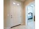 Home entryway with white door and view into bedroom at 5352 N Gila Trail Dr, Eloy, AZ 85131