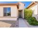 Front entry with walkway, landscaping, and neutral-colored exterior at 5352 N Gila Trail Dr, Eloy, AZ 85131