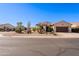 Single-story home with two-car garage and desert landscaping at 5352 N Gila Trail Dr, Eloy, AZ 85131