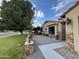 Landscaped front yard with spacious patio and inviting entrance at 5402 E Paradise Ln, Scottsdale, AZ 85254