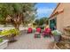 Inviting patio features red chairs and a water fountain at 5402 E Paradise Ln, Scottsdale, AZ 85254