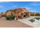 Home exterior showcasing a inviting pool and patio area at 5402 E Paradise Ln, Scottsdale, AZ 85254