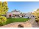 Relaxing backyard with a firepit and a view of the pool at 5432 E Grandview Rd, Scottsdale, AZ 85254