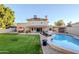 Spacious backyard oasis featuring a pool and patio area at 5432 E Grandview Rd, Scottsdale, AZ 85254