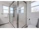 Modern bathroom with a large glass shower, double sinks, and updated fixtures at 5432 E Grandview Rd, Scottsdale, AZ 85254