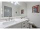 Clean bathroom with white cabinets and quartz countertop at 5432 E Grandview Rd, Scottsdale, AZ 85254