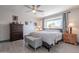 Main bedroom with large window and grey bedding at 5432 E Grandview Rd, Scottsdale, AZ 85254