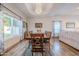 Spacious dining area with hardwood floors and a view to the backyard at 5432 E Grandview Rd, Scottsdale, AZ 85254