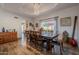 Elegant dining room with a large table and backyard view at 5432 E Grandview Rd, Scottsdale, AZ 85254