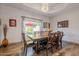 Bright dining room featuring a wooden table and chandelier at 5432 E Grandview Rd, Scottsdale, AZ 85254