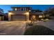 Two-story home with landscaped yard and two-car garage at 5432 E Grandview Rd, Scottsdale, AZ 85254