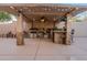 Covered outdoor kitchen with stainless steel appliances at 5432 E Grandview Rd, Scottsdale, AZ 85254