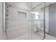 Clean shower with glass enclosure and modern tile at 5432 E Grandview Rd, Scottsdale, AZ 85254