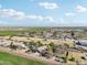 Aerial view of a home on acreage with agricultural fields surrounding it at 5819 S 102Nd Dr, Tolleson, AZ 85353