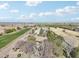 Aerial view of house on a large lot with surrounding farmland at 5819 S 102Nd Dr, Tolleson, AZ 85353