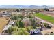 Aerial view of home with large lot, RV, and mountain backdrop at 5819 S 102Nd Dr, Tolleson, AZ 85353