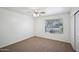 Simple bedroom with carpeted floors and a window with blinds at 5819 S 102Nd Dr, Tolleson, AZ 85353