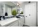 Clean and contemporary bathroom with double sinks and updated fixtures at 6102 E Nisbet Rd, Scottsdale, AZ 85254