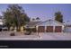 Beautiful home exterior with three car garage at 6102 E Nisbet Rd, Scottsdale, AZ 85254